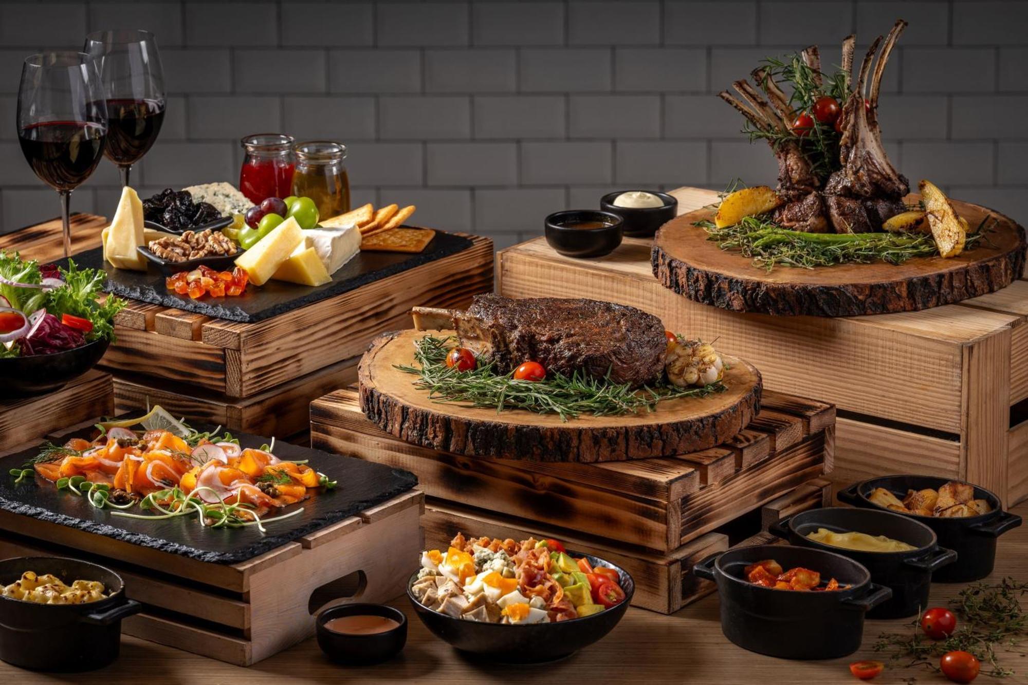 Phuket Marriott Resort & Spa, Merlin Beach Patong Exterior foto A selection of dishes at the buffet